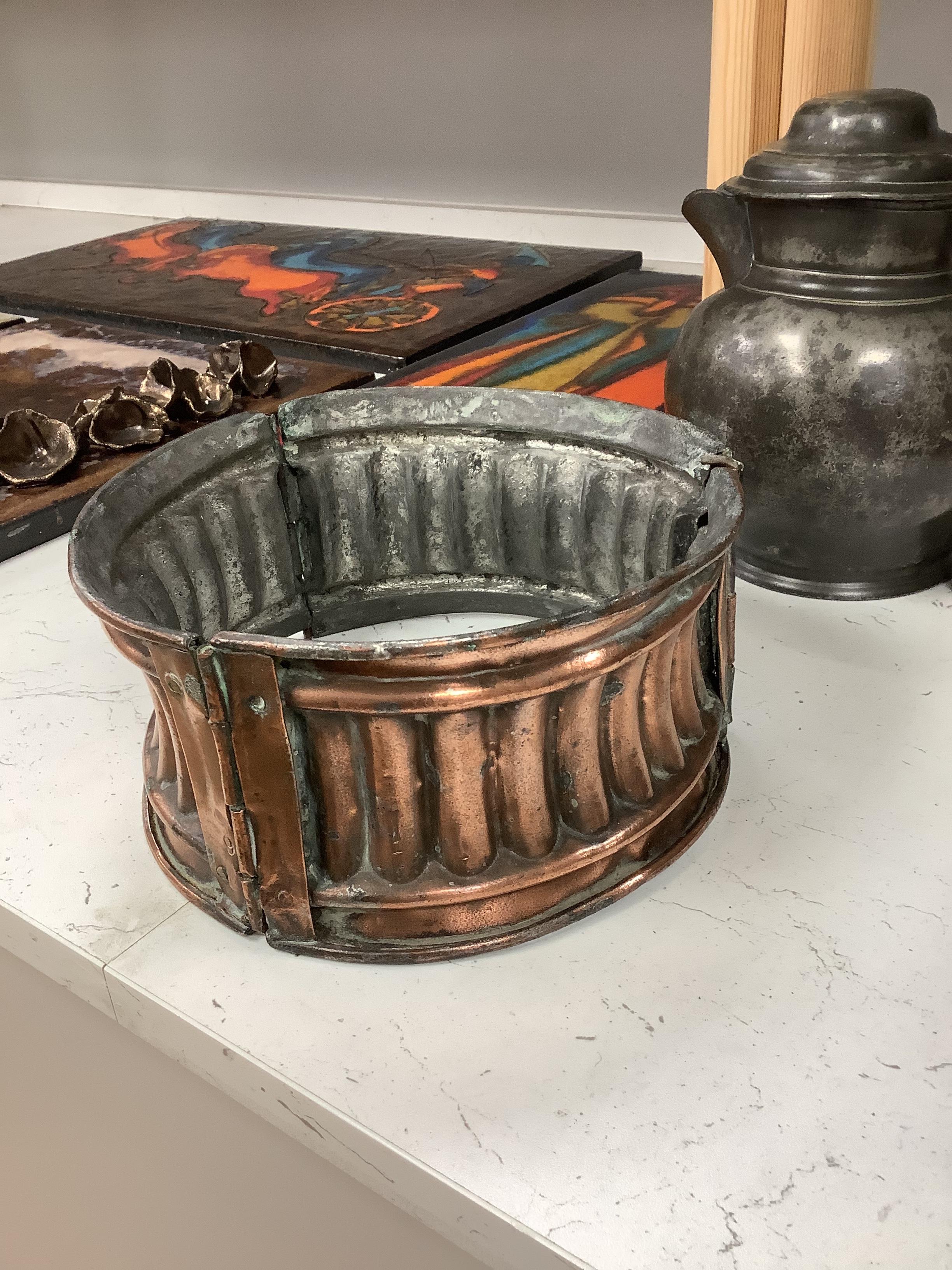 An unusual Victorian copper pie-mould, teak cased set of Bezique scorers, a brass link chain, a 19th century pewter pitcher, an Art Nouveau oil lamp, and two other items